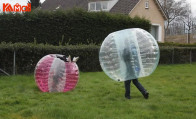 a giant vibrant red zorb ball